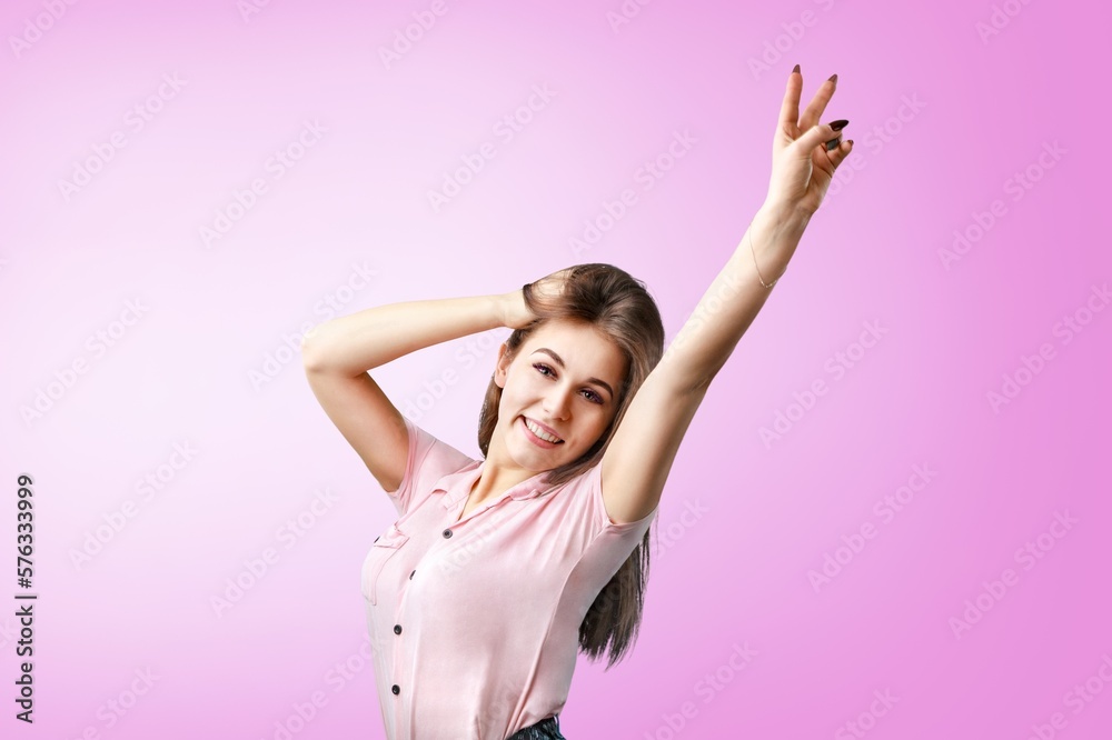 Happy young smart woman posing on background Happy young smart woman posing on background