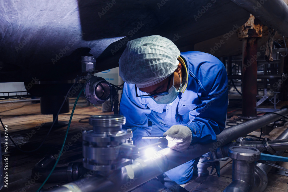 Welding arc argon worker male repaired metal is welding sparks industrial construction repair pipe stainless Welding arc argon worker male repaired metal is welding sparks industrial construction repair pipe stainless