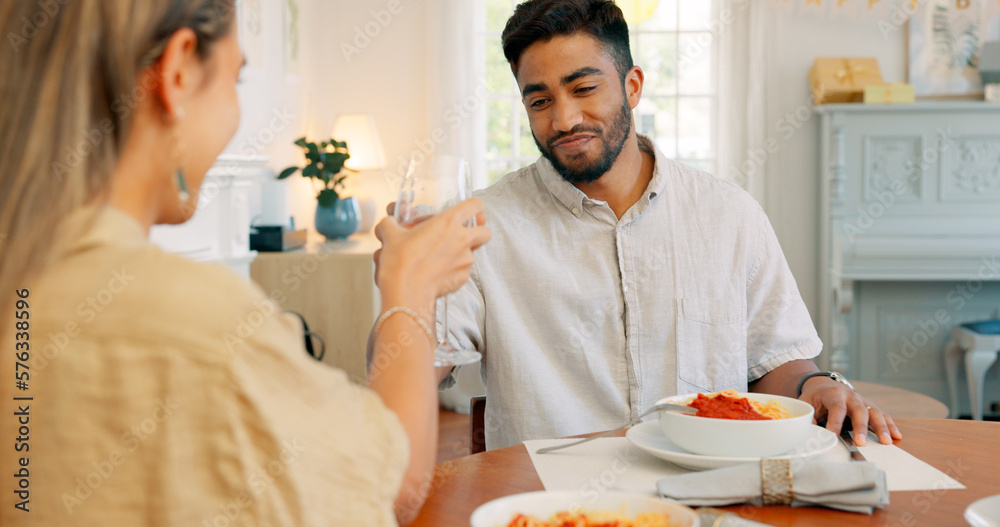 Toast, love and couple on a wine date in a house in celebration of a happy marriage and anniversary. Smile, romance and young woman drinking alcohol and eating spaghetti food with a romantic partner Toast, love and couple on a wine date in a house in celebration of a happy marriage and anniversary. Smile, romance and young woman drinking alcohol and eating spaghetti food with a romantic partner