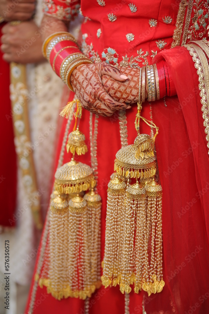 Punjabi wedding in red lengha 