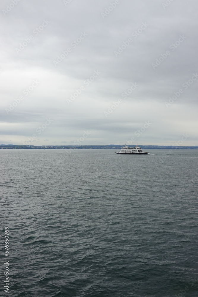 Panorama of Bodensee lake and a ferry from Friedrichshafen, Germany