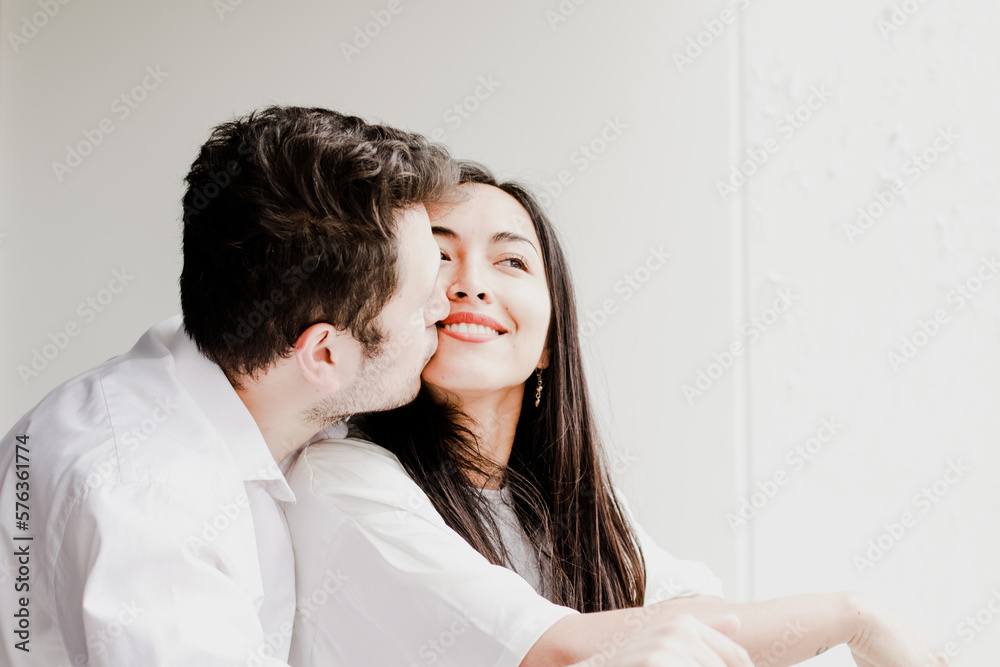 Photo of young couple enjoying, smiling, loving each other. Concept of lifestyle, human relations, love. Photo of young couple enjoying, smiling, loving each other. Concept of lifestyle, human relations, love.