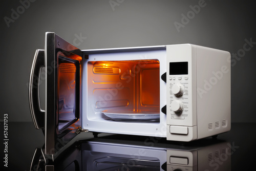 Opened empty microwave oven, studio or kitchen shot. AI generative