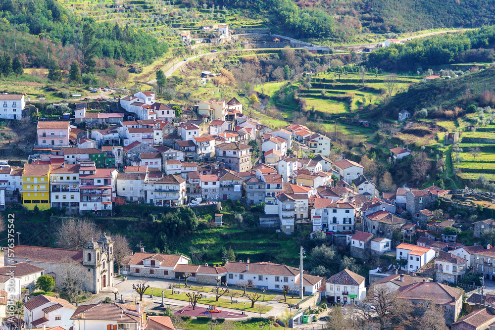 quaint hillside village set in a river valley