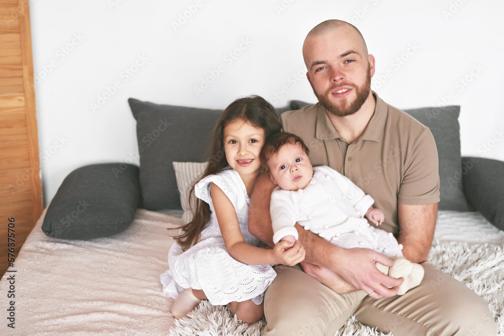 Father with daughter and son. Happy father's day. Parenthood and childhood Father with daughter and son. Happy father's day. Parenthood and childhood
