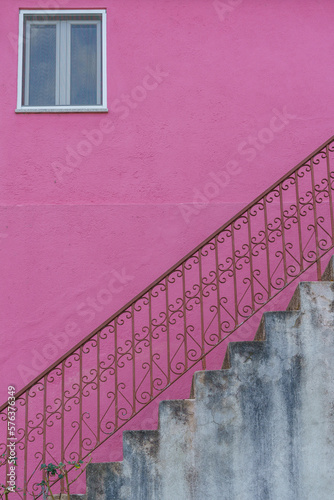graphic abstract of a purple wall and stairway