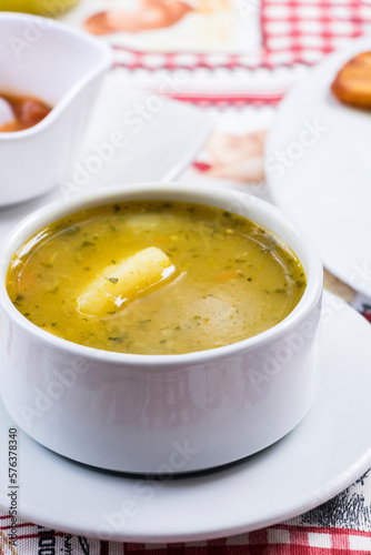Potato soup broth for Colombian lunch main dish starter