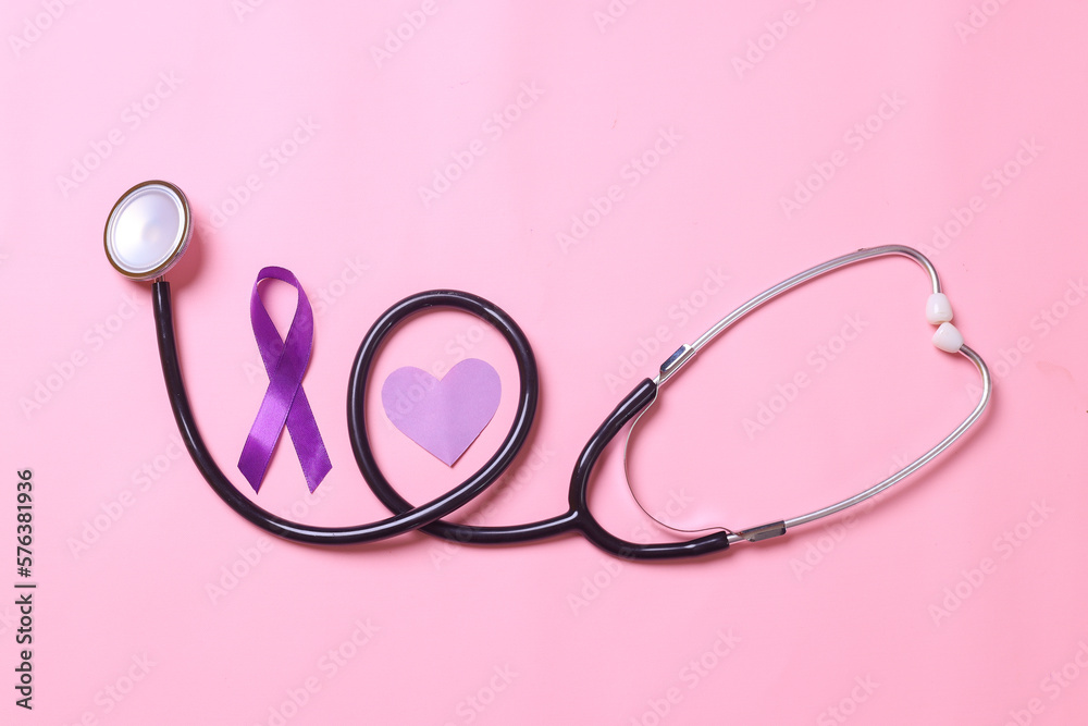 Stethoscope with purple ribbon and heart shape on pink background. Healthcare and medical concept. World cancer day. Epilepsy day. Stethoscope with purple ribbon and heart shape on pink background. Healthcare and medical concept. World cancer day. Epilepsy day.