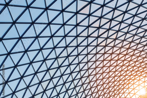 Obraz na płótnie Glass ceiling in the mall from the inside with a solar flare, modern texture w salonie
