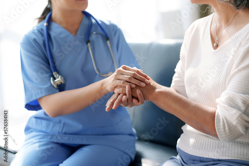 Doctor is counselling the patient and encouraging the patient from the disease.