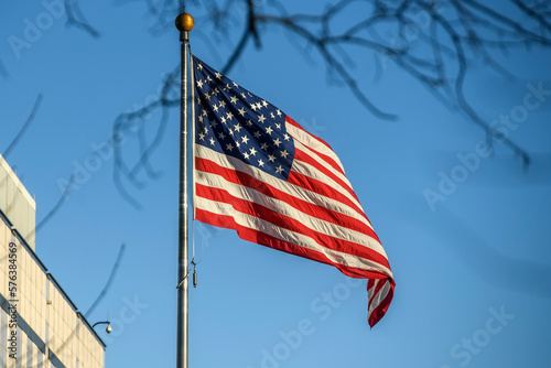 The flag of the United States of America flies on a flagpole outside the embassy in Kyiv, Ukraine. February 2023