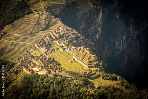 aerial view of Machu Picchu Sacred Inca Ruins, Peru, Sunny Valley, Aerial Drone Shot, Daylight over Latin American Indigenous Temple photo