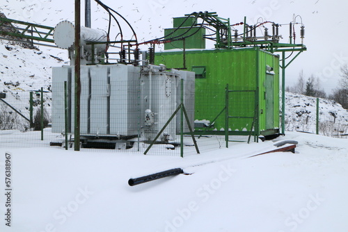 Green containers of gas power plant © Andrey