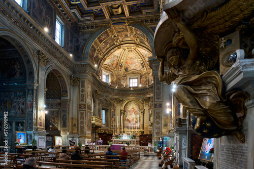 Mass at San Marcello al Corso, baroque styled church in Rome, Italy photo