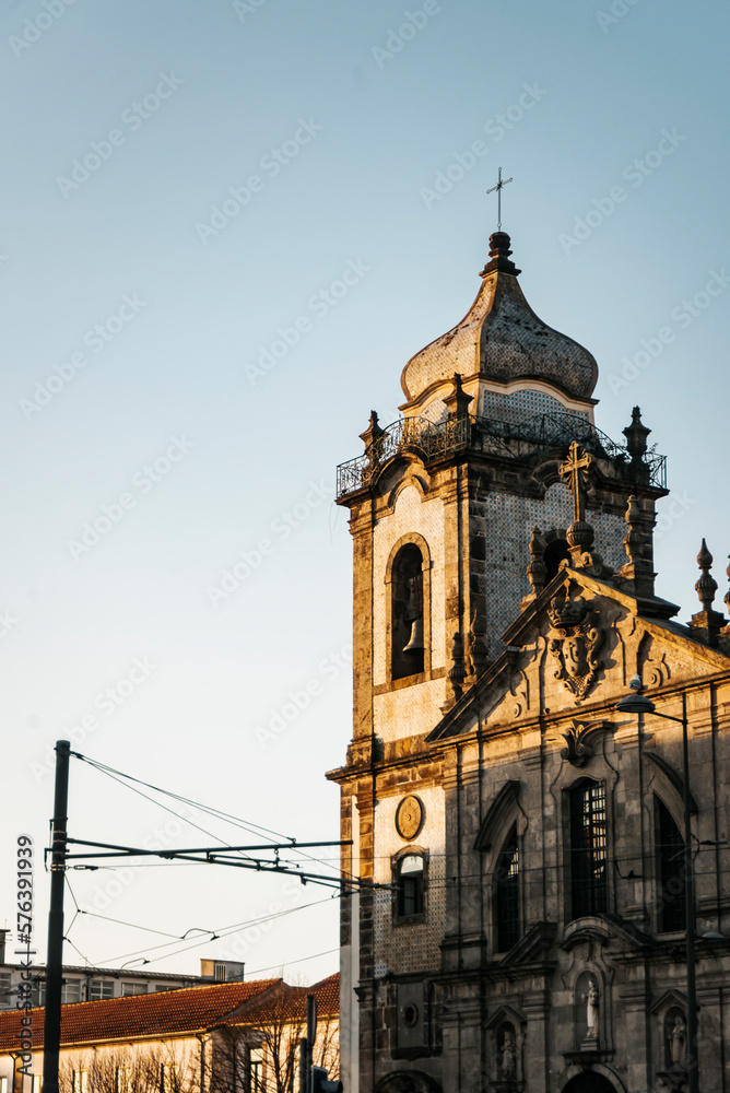 Fototapeta premium View of the Igreja do Carmo tower of the 18th century Igreja dos Carmelitas at sunset, Porto ,Portugal