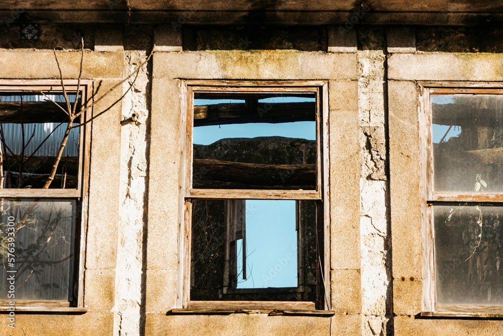 Three stone-framed windows in a ruined building, Porto, Portugal, Three stone-framed windows in a ruined building, Porto, Portugal,