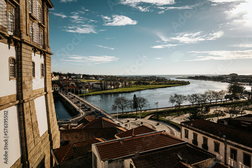 View of the Taipas Bridge in Vila do Conde, the Ave River and blue sky with clouds - Portugal