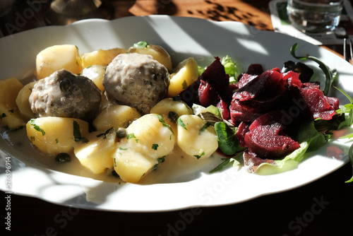 german dish Königsberger Klopse with potatoes and beetroot photo
