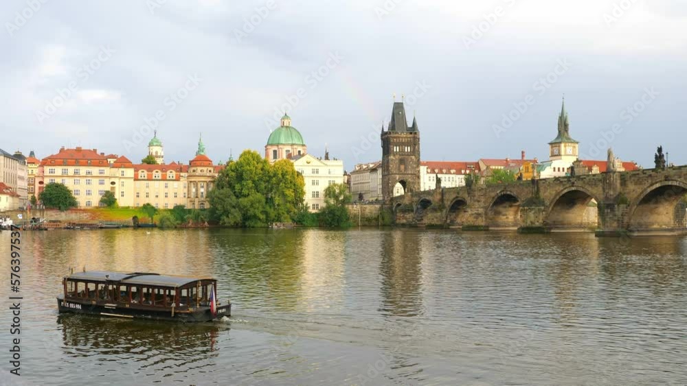 Prague, Czech Republic - August 30, 2021: View of Charles Bridge in Prague, Czech Republic. popular tourist attraction. Travel and sights of city breaks. landmarks, travel guide and postcard. Prague, Czech Republic - August 30, 2021: View of Charles Bridge in Prague, Czech Republic. popular tourist attraction. Travel and sights of city breaks. landmarks, travel guide and postcard.