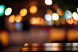 Tabletop, wooden surface against the background of defocused lights, holiday background.
