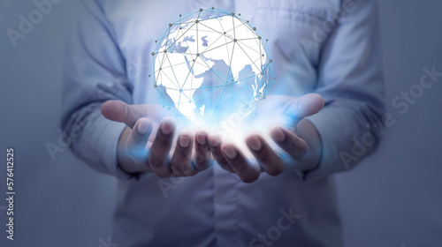 Businessman holding globe on blurred background