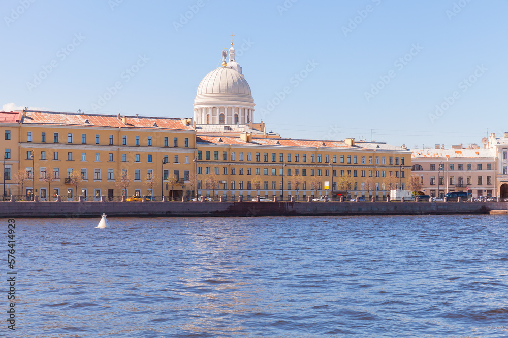 Cityscape of Saint-Petersburg on a sunny day. Neva river coast