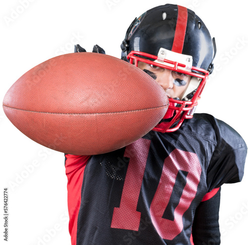 American football player holding ball isolated on white background