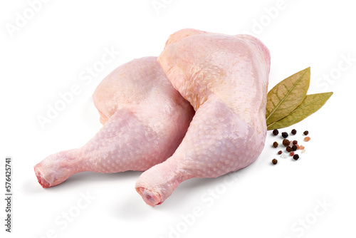 Raw chicken leg quarters, isolated on white background. High resolution image.