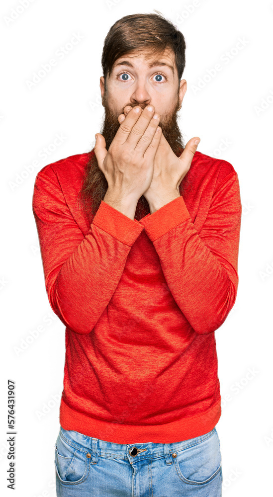 Redhead man with long beard wearing casual clothes shocked covering mouth with hands for mistake. secret concept. Redhead man with long beard wearing casual clothes shocked covering mouth with hands for mistake. secret concept.