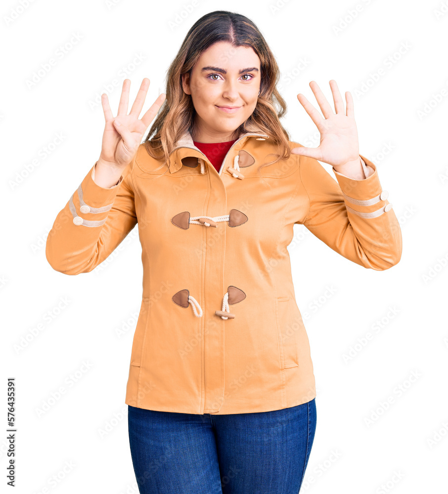 Young caucasian woman wearing casual clothes showing and pointing up with fingers number nine while smiling confident and happy. Young caucasian woman wearing casual clothes showing and pointing up with fingers number nine while smiling confident and happy.