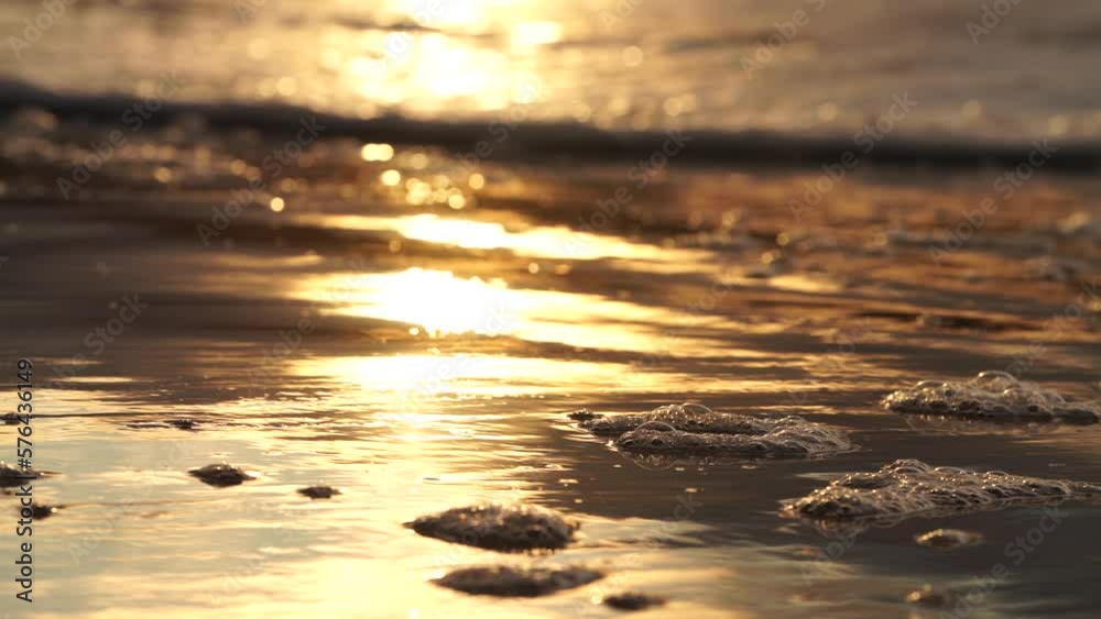 waves rolling in on the sand on the beach in australia waves rolling in on the sand on the beach in australia