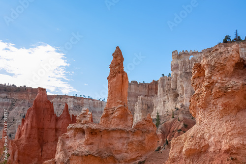 Close up scenic view of the wall of windows on Peekaboo hiking trail in Bryce Canyon National Park, Utah, USA. Massive steep hoodoo sandstone rock formations in natural amphitheatre in sunny summer