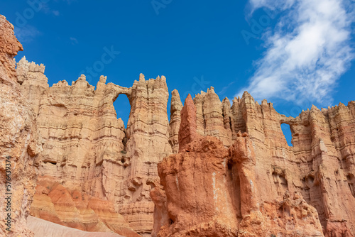 Close up scenic view of the wall of windows on Peekaboo hiking trail in Bryce Canyon National Park, Utah, USA. Massive steep hoodoo sandstone rock formations in natural amphitheatre in sunny summer