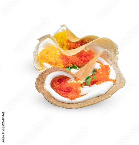 Three Khanom Buang thai crispy pancakes isolated on white background photo