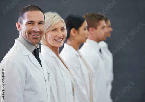 Your first line of defense against illness. Cropped shot of a group of doctors standing in a row.