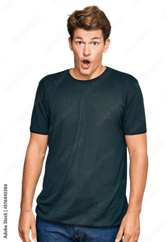 Handsome caucasian man wearing casual clothes afraid and shocked with surprise expression, fear and excited face.