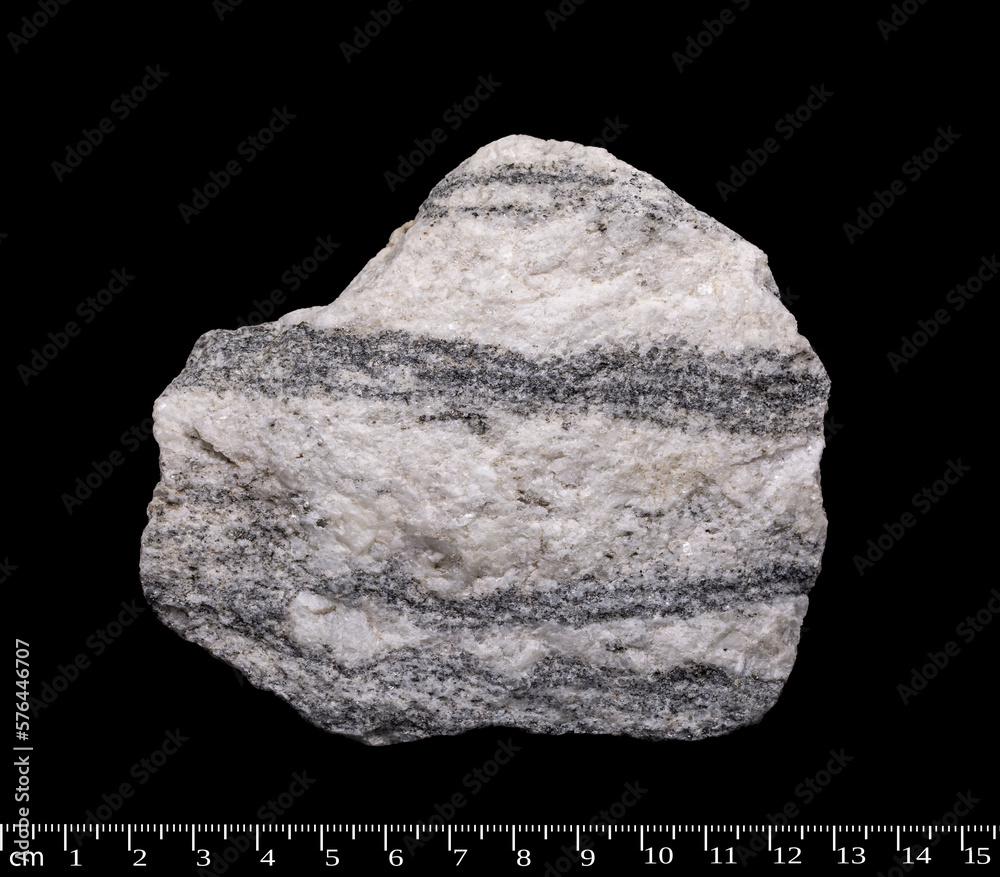 Gneiss metamorphic rock macro shot isolated on black background Gneiss metamorphic rock macro shot isolated on black background