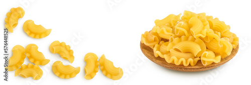 Pasta cornetti creste macaroni isolated on white background . Top view with copy space for your text. Flat lay