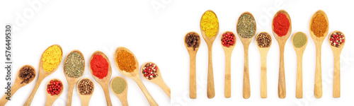 mix of spices in wooden spoon isolated on a white background with copy space for your text.. Top view. Flat lay. Set or collection
