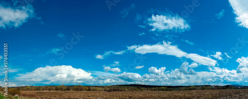Panoramic photo of the soil before planting. Panorama of land for planting and growing crops.