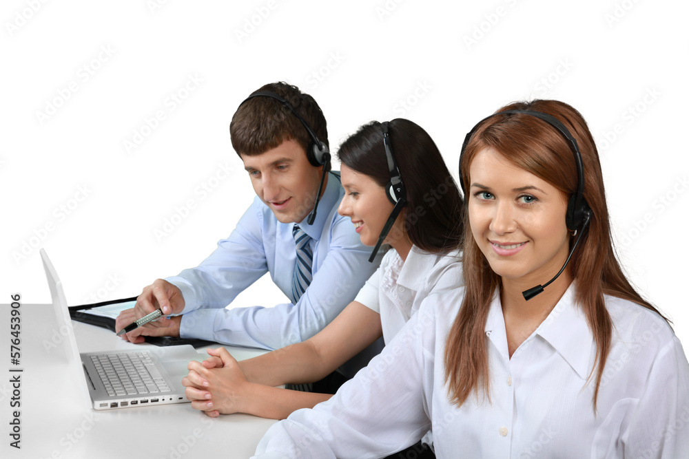 Young businessman and women working together in office isolated on white background Young businessman and women working together in office isolated on white background