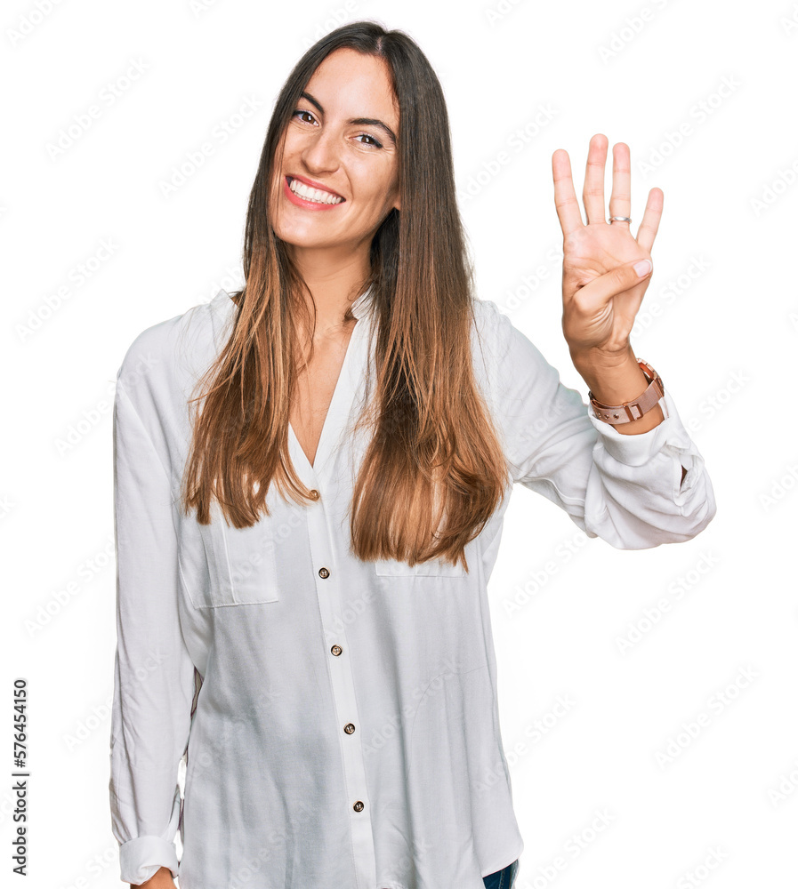 Young beautiful woman wearing casual clothes showing and pointing up with fingers number four while smiling confident and happy. Young beautiful woman wearing casual clothes showing and pointing up with fingers number four while smiling confident and happy.