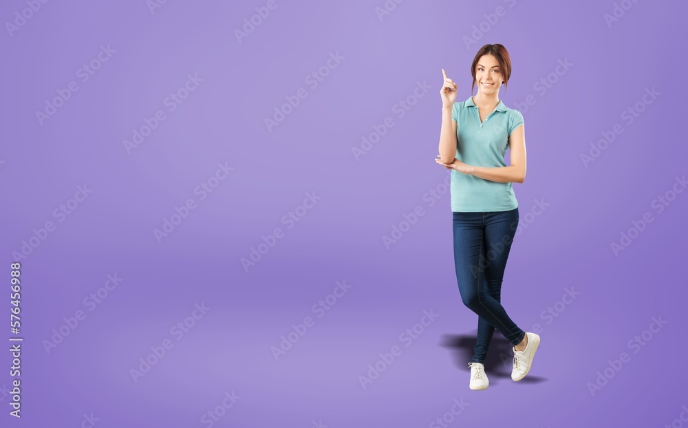 Young happy girl indicate hand to empty space Young happy girl indicate hand to empty space