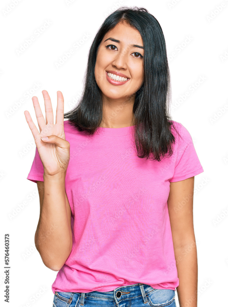 Beautiful asian young woman wearing casual pink t shirt showing and pointing up with fingers number four while smiling confident and happy. Beautiful asian young woman wearing casual pink t shirt showing and pointing up with fingers number four while smiling confident and happy.