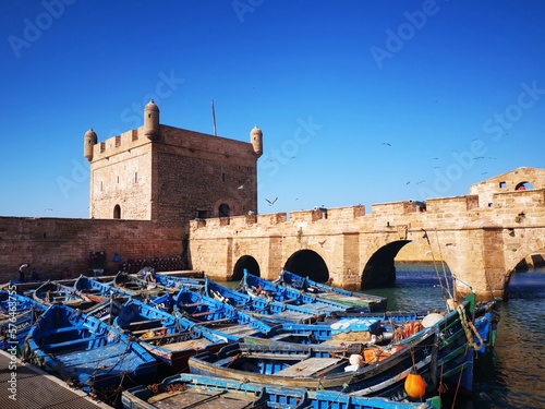 Cuadro en lienzo Traditional Moroccan fishing boats in the harbor of Essaouira, Morocco