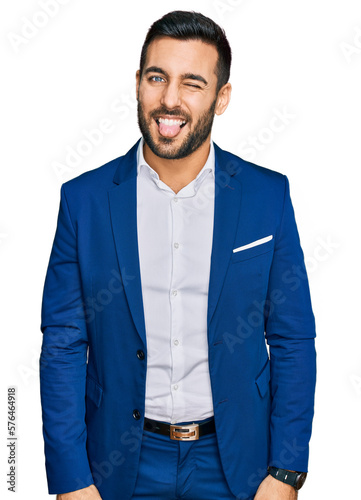 Young hispanic man wearing business jacket sticking tongue out happy with funny expression. emotion concept. © Krakenimages.com