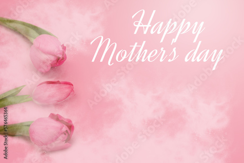Happy Mother's Day lettering and tender tulips under white mist on pink background. Greeting card concept. Copy space