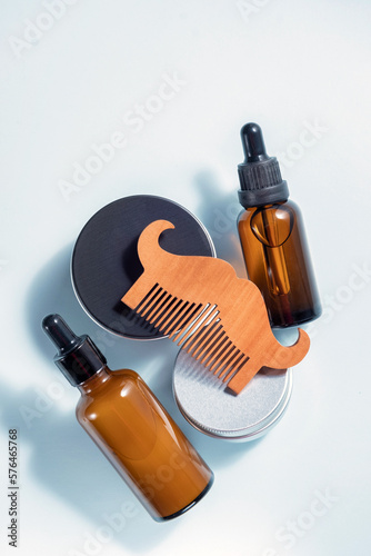 Flat lay composition with men's cosmetic products on color background. Space for design