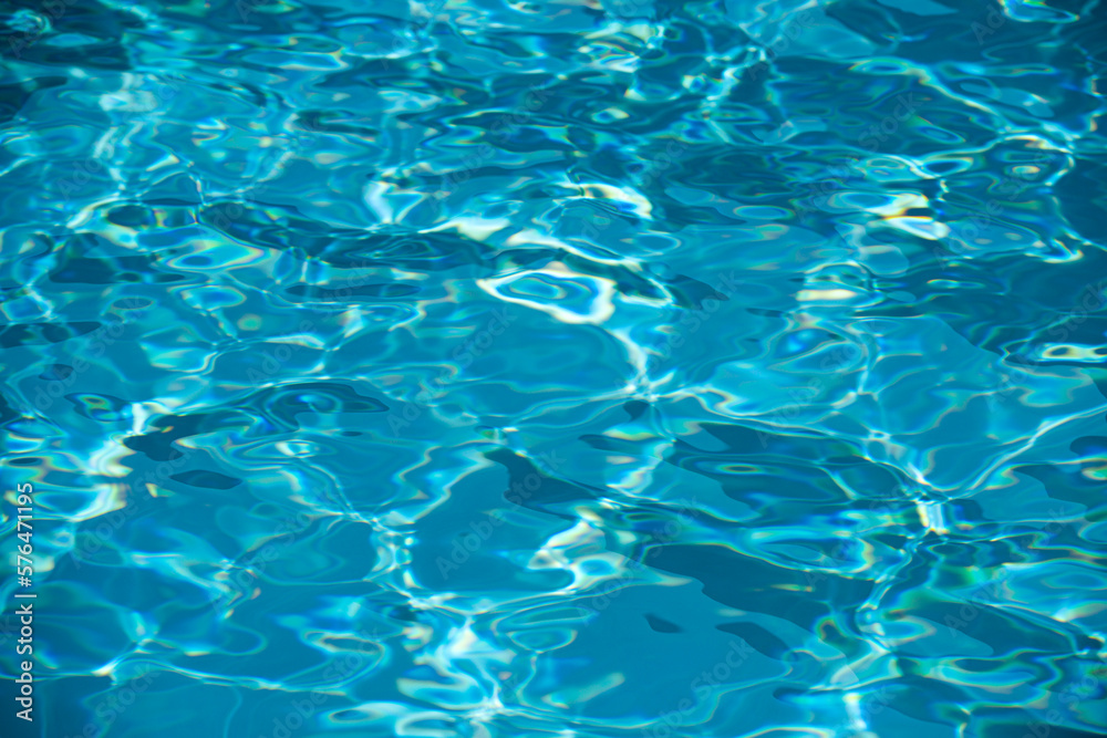 Pool water background, blue wave abstract or rippled water texture background.