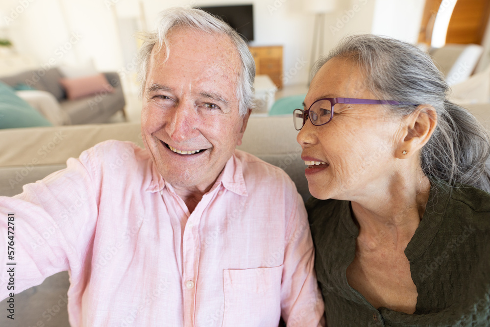 Happy senior diverse couple having video call Happy senior diverse couple having video call